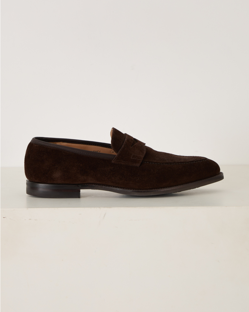 dark brown low-top slip-on shoe