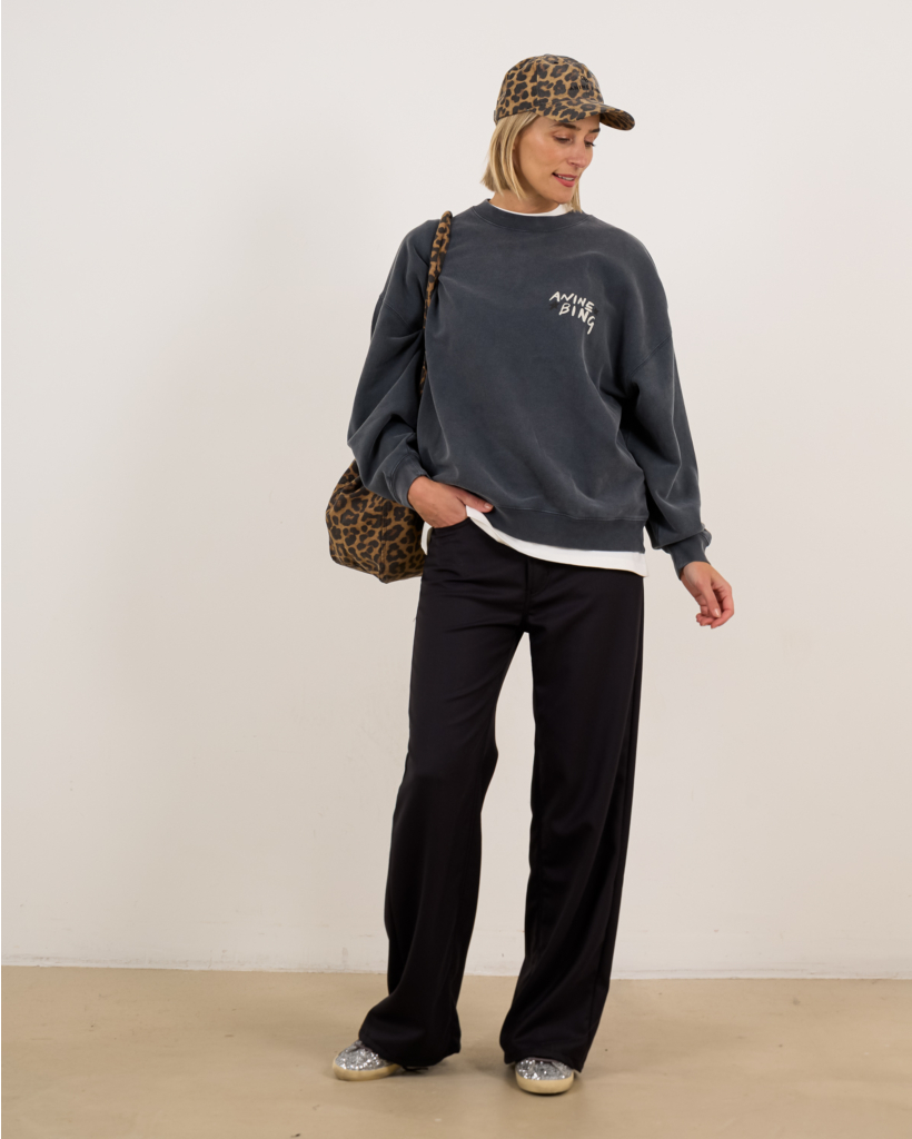 Black sweater with text