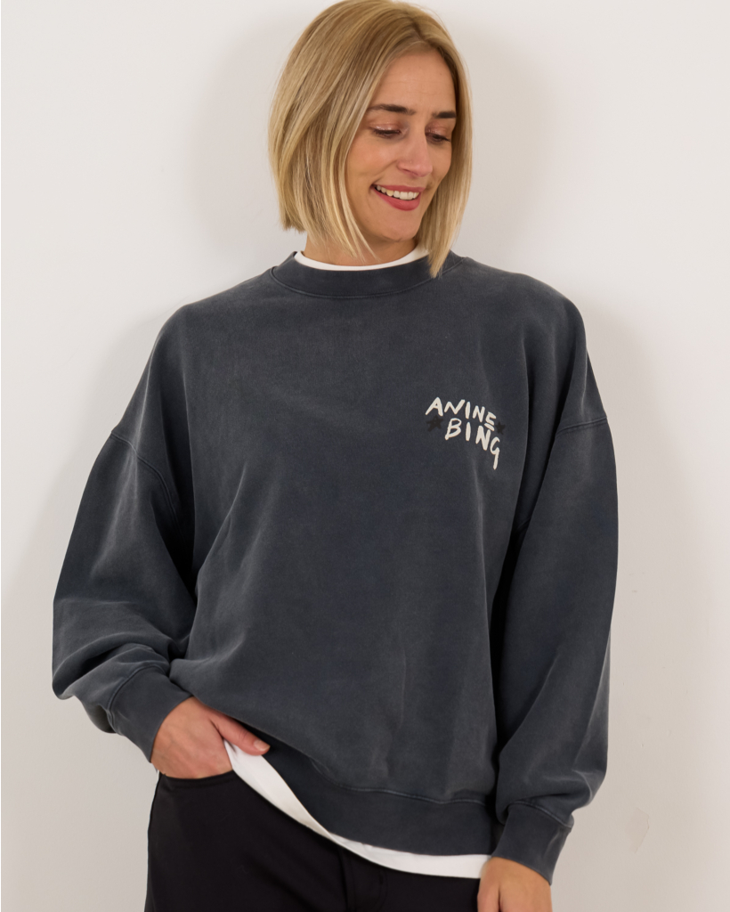 Black sweater with text