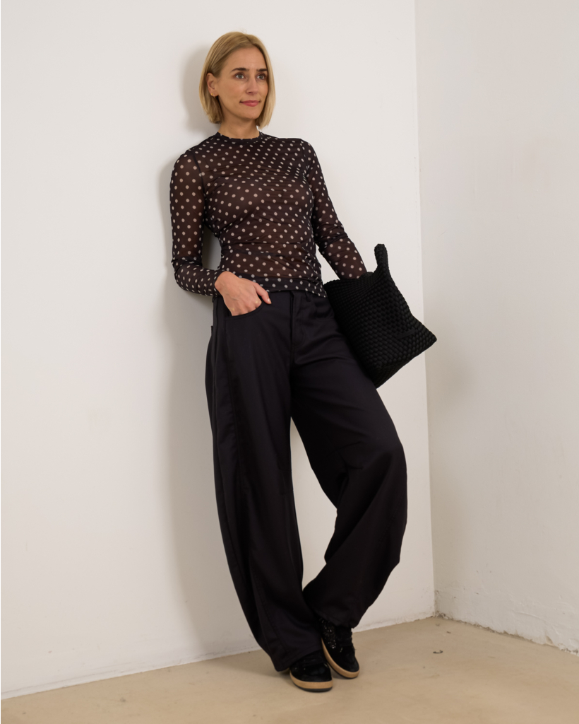 Sheer black polka-dot shirt