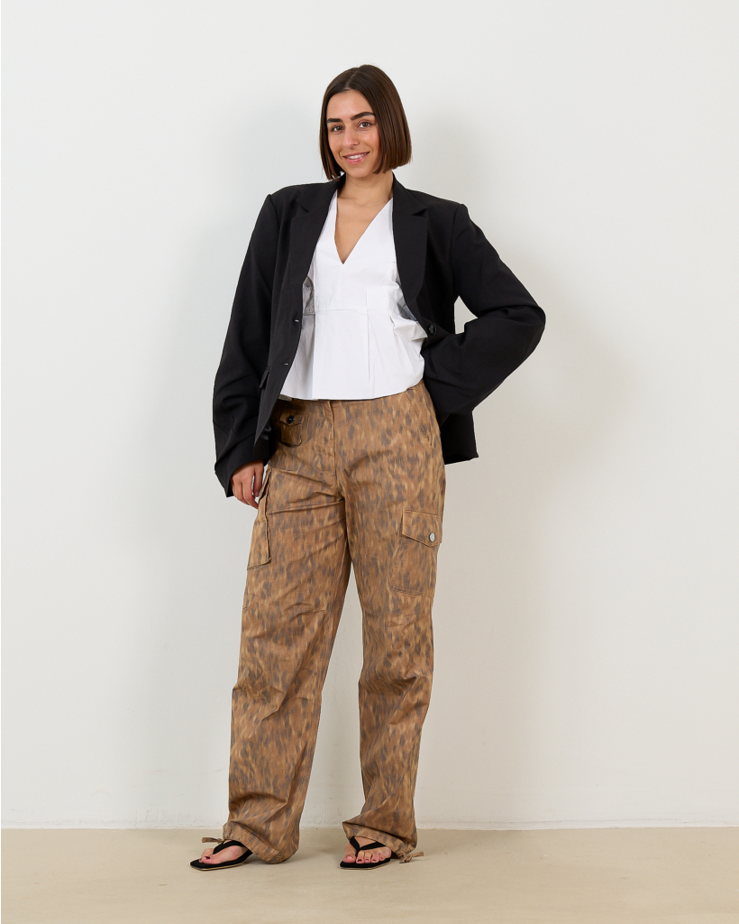 White Sleeveless V-Neck Peplum Top